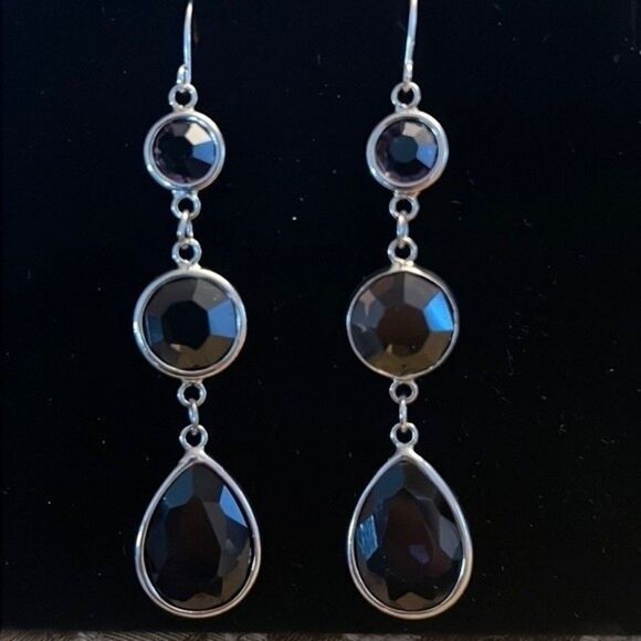Handcrafted silver tone earrings with a Smokey colored stone. - Picture 1 of 4